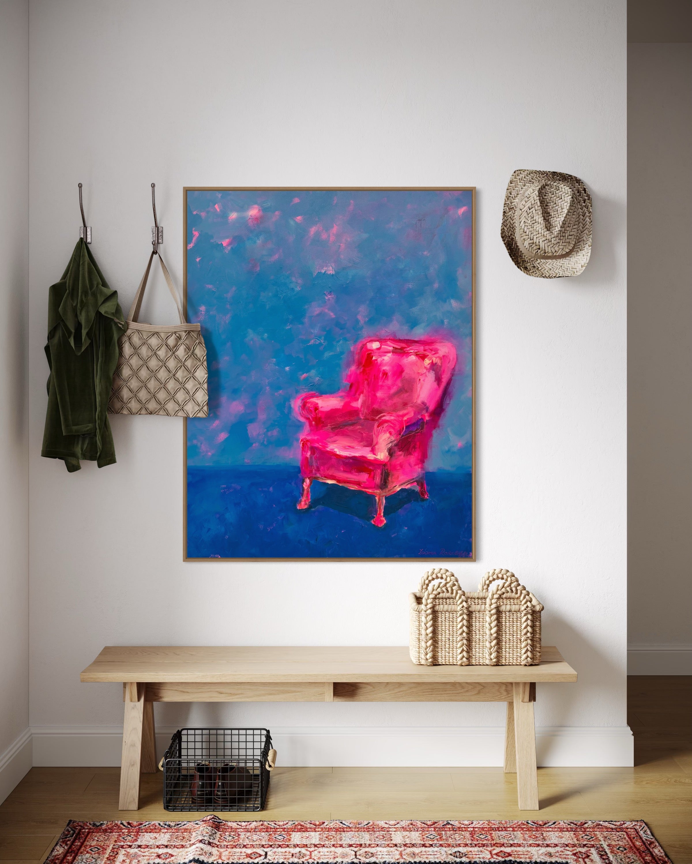 Modern interior with a pink chair painting on the wall, wooden bench, and decorative items. Painting by Lauren Ratcliffe a contemporary South African Artist known for her bold use of colour and interiorscape paintings